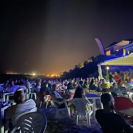 Casa De Playa Ferienhaus *